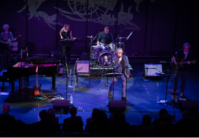 Paul Muldoon and band Rogue Oliphant perform onstage
